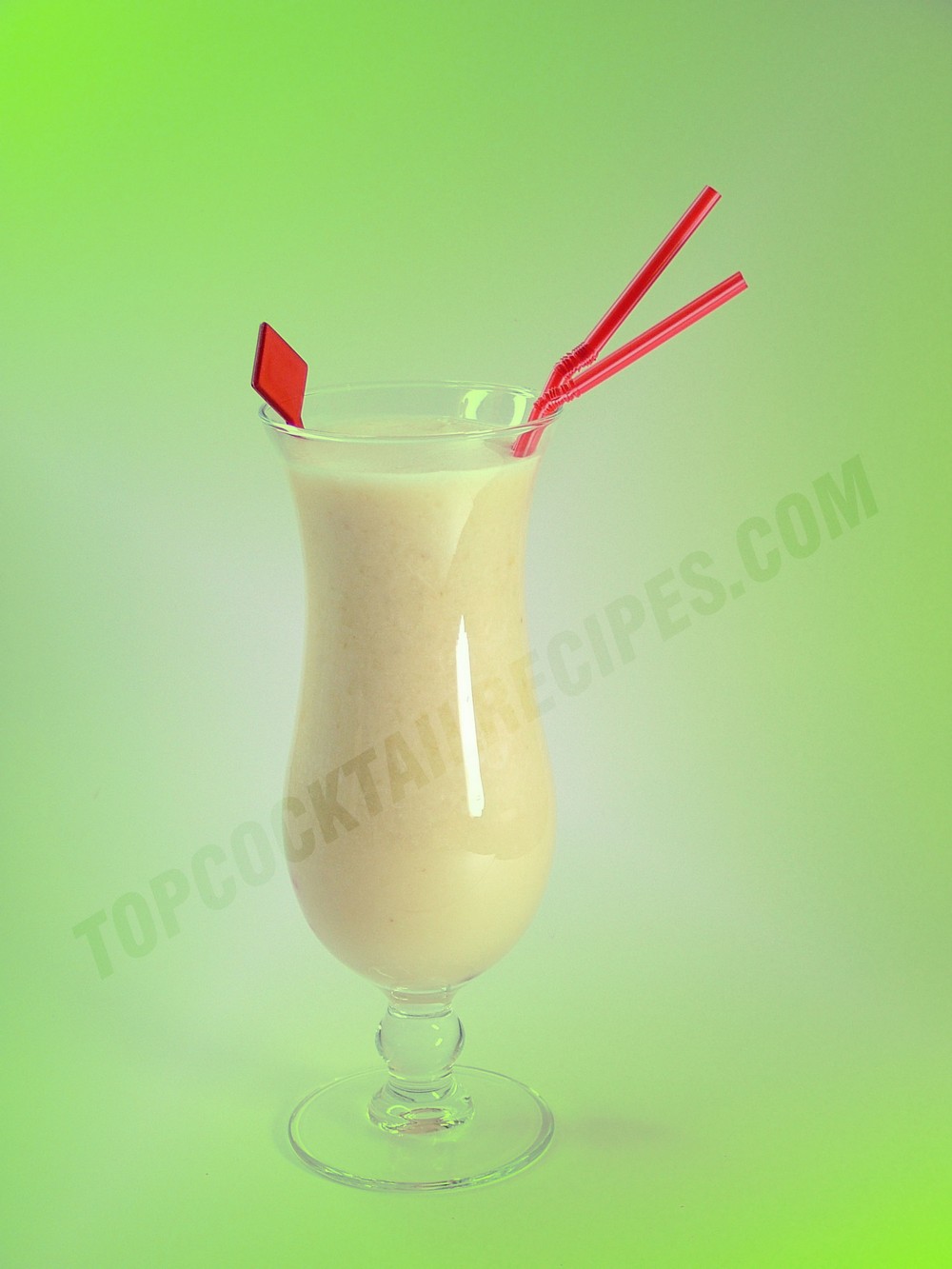 cocktail for children made up of banana smoothie and pineapple juice